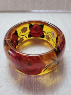 Translucent Big Flowers Bakelite Bangle 4.16 oz 1.50" wide 2.50" I.D. 3 1/4" O.D. Tested Lucite Bangle Bracelet As Gift, Lucite Bangle Bracelets As Gift, Lucite Bangle Bracelet For Gift, Bakelite Bangles, Big Flowers, Bangle Bracelets, Give It To Me, Jewelry Bracelets, Bangles