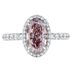 This ring features a 2 carat Fancy Purple-Pink SI2 Clarity diamond. The stone is completely clean to the eye. With a micro-pave platinum mounting featuring 40 stones for a total weight of 0.40 cts. Along with GIA Certificate. Size 6. Resizeable upon request. Viewings available in our NYC showroom by appointment. Pink Diamond Ring, Gia Certificate, Special Ops, Purple Diamond, White Room, I Love Jewelry, Vintage Engagement, Gia Diamond, 2 Carat