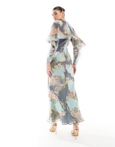 ASOS DESIGN long sleeve ruffle bias maxi dress with cape detail in floral print | ASOS Flowy Maxi Dress With Cape Sleeves For Spring, Spring Party Maxi Dress With Cape Sleeves, Floral Print Dress With Cape Sleeves For Party, Dress With Cape, Inspo Board, Cape Dress, Print Trends, Colorful Garden, Wedding Inspo