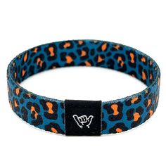 Jaguar Print Wristband Bracelet. Available sizes:  Extra Small 5.5" (petites + kids) Small 6.5" (most common fitting size) Medium 7.5" (large wrists) Large or Anklet 8.5" (very large wrists or anklet) 1/2" Width Reversible surf and beachy prints. Elastic blend material, can stretch to desired fit. Packaged in natural drawstring gift pouches. Machine washable. Chlorine and saltwater safe. Loose Bracelet, Beachy Prints, Jaguar Print, Wristband Bracelet, Hang Loose, Jaguar, Arm Band, Anklets, Bangle Bracelets