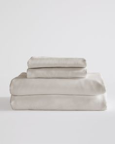 three white sheets stacked on top of each other