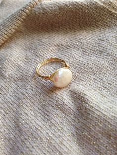 Minimalist Adjustable Pearl Ring For Formal Occasions, Adjustable Oval Pearl Ring For Wedding, Minimalist Adjustable Pearl Ring For Wedding, Handmade Round Pearl Ring, Handmade Minimalist Pearl Ring For Wedding, Minimalist Handmade Pearl Wedding Ring, Adjustable Pearl Drop Round Rings, Elegant Adjustable Pearl Ring With Charm, Handmade Adjustable Elegant Pearl Ring