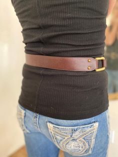 "Juicy Couture, Brown Leather Belt, Brown, Fits 29\" -34\" Very nice brown leather Juicy Couture belt with buckle PLEASE SEE MEASUREMENTS Length to largest hole: 34\" Length to smallest hole:29\" Width: 1\"1/2 Excellent condition NK906DN Juicy Couture, Brown Leather Belt, Brown, Fits 29\" -34\"" Brown Leather Fitted Corset Belt, Luxury Brown Leather Corset Belt, Brown Leather Steampunk Corset Belt, Vintage Handmade Brown Belt, Adjustable Brown Belt With Rivets, Perfect Together, Brown Leather Belt, Juicy Couture, Leather Belt