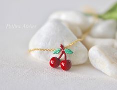 cherry necklace in lipstick red. gold/ silver chain sweet...I love you cherry much :) ♥ pendant size: 15x12mm ♥ total length: around 16 inches + 2 inch extender ♥ metal : gold/ silver plated ♥ lobster clasp ♥ To view more simple and modern necklaces, please go to https://www.etsy.com/shop/PolliniAtelier?section_id=7162802&ref=shopsection_leftnav_3 ♥ Please take note of the sizes and dimensions as they may appear larger or smaller from photos on certain monitors/computers. ♥ Thanks for stoppi Cute Cherry-colored Jewelry For Gifts, Cute Cherry-colored Jewelry Gift, Cute Red Charm Necklace For Gift, Cute Red Charm Necklaces For Gifts, Red Cherry Print Jewelry For Gifts, Cute Handmade Red Charm Necklaces, Cute Red Handmade Charm Necklace, Cute Handmade Red Charm Necklace, Trendy Red Charm Necklaces For Gifts