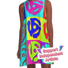 a woman wearing a colorful dress with an abstract design on it's chest and shoulders