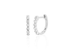 Our diamond bezel huggie earring features 0.11 carats of diamond set in 14k gold. Sold as a pair Diameter measures: 12mm Inner huggie diameter: 10mm Silver Diamond Hoop Earrings With Single Diamond, White Gold Hoop Earrings With Single Diamond For Anniversary, White Gold Hoop Earrings With Diamond, Anniversary White Gold Hoop Earrings With Single Diamond, White Gold Huggie Diamond Earrings With Single Diamond, Anniversary Sterling Silver Hoop Earrings With Single Diamond, Formal Round Huggie Earrings With Single Cut Diamonds, White Gold Huggie Earrings With Single Diamond For Anniversary, Diamond Huggie Earrings With Single Diamond