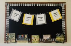 a bulletin board with several books on it