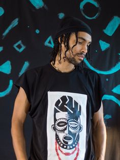 Handmade by Nigerian Designer Black Colony. This sleeveless t- shirt has a bold African design for a modern day take on traditional African attire.