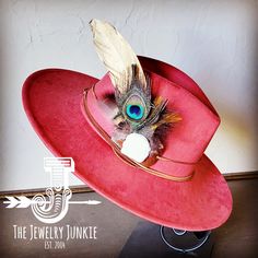 If you’re looking for the perfect accessory to complement your favorite boho style, look no further. This Boho-Style Western Felt Hat w/ Natural Feather & Turquoise Hat Accent by The Jewelry Junkie is absolutely everything that you need. Not only is it easy to incorporate into any and all outfits, but the genuine leather and natural feathers of the band immediately elevate whatever it is you’re wearing. One Size Hat with adjustable inner hat liner (see last photos) The same primary feathers will Turquoise Hat, Western Hat, Leather Hat, Feather Hat, Gold Feathers, Medium Handbags, Packing Jewelry, Leather Hats, Turquoise Howlite