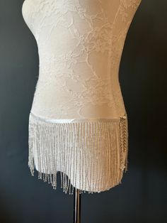 High quality beaded fringe belt. Fringe is 6" wide with a clasp and chain to make this adjustable for it to sit where you prefer.  Wear over a pair of Denim shorts crate a unique look.  Choose from a variety of colours and make your outfit stand out at the next event, party, or festival! (Pictured is Silver) Sizes available, just choose your waist size in inches and your belt will be custom made with an extra 12inch chain (approx) to allow for adjustments. Perfect for parties, festivals, dance c Waist Belt Pearls, Fringe Corset Belt, Wedding Pearl Beaded Bridal Belt, Crystal Fringe Belt, Beads Belt, Fringe Belt, Fringed Belt, Dance Festival, Fan Design