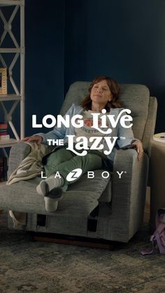 a woman sitting in a recliner chair with the words long live the lazy on it