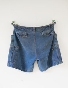 Vintage cargo shorts w/ adjustable silver hardware Waist 46 Utility Style Short Cargo Jeans With Pockets, Utility Cargo Shorts Jeans With Pockets, Utility Jean Shorts With Multiple Pockets, Short Cargo Jeans With Side Pockets, Short Cargo Jeans With Pockets, Utility Denim Jean Shorts, Utility Jean Shorts With Pockets, Utility Short Cargo Jeans With Multiple Pockets, Utility Cargo Jean Shorts