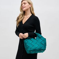 Woman wearing Forest Sol and Selene Resilience - Woven Neoprene Tote 841764108591 View 1 | Forest Modern Woven Evening Bag, Versatile Green Shoulder Bag With Braided Handles, Modern Woven Hobo Shoulder Bag, Modern Woven Leather Shoulder Bag For On-the-go, Modern Woven Shoulder Bag, Modern Woven Leather Shoulder Bag, Modern Woven Crossbody Shoulder Bag, Modern Woven Bags For On-the-go, Modern Green Bag With Woven Leather