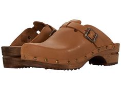 Sanita Kristel - Women's Clog Shoes : Cognac : A sleek oiled leather upper with stylish stud details, the Sanita Kristel slip-on clog keeps you cozy and on-trend. Adjustable buckle at instep with leather and synthetic linings with a leather-lined heel pad. Lime tree wood midsole and outsole. Imported. Measurements: Heel Height: 1 3 4 in Weight: 14 oz Product measurements were taken using size 39 (US Women's 8-8.5), width Regular. Please note that measurements may vary by size. Weight of footwear Brown Closed Toe Clogs With Studded Outsoles, Casual Brown Clogs With Studded Rubber Outsoles, Leather Slip-on Clogs With Buckle Closure, Leather Clogs With Buckle Closure For Fall, Leather Clogs With Rubber Sole For Fall, Leather-lined Closed Toe Clogs For Work, Workwear Closed Toe Clogs With Leather Lining, Workwear Clogs With Leather Lining And Closed Toe, Brown Clogs With Buckle Closure For Fall