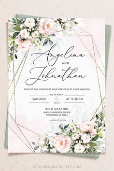 an elegant wedding card with pink flowers and greenery