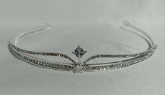 "Handmade Tiaras/Crown Diamond Weight -- 9.12ct Diamond shape -- Round/Cubic/Pear Diamonds --American Diamond Metal -- Sterling Silver Silver Purity --92.5% Silver Wt. -- 79.600gm Tiaras Length -- 16inch) Tiaras Finishing white/gold Listing is For One (1) Piece These items are handmade, All are designed and handmade me and team with precision, Perfect craftsmanship and strong interest! We are continuously adding new products in our store. So keep coming back to see more great deals on gems in ou Adjustable Silver Wedding Crown, Elegant Adjustable Crown For Wedding, Silver Adjustable Crown With Pinched Shape, Elegant Adjustable Crown With Structured Shape, Elegant Formal Jewelry With Tall Crown, Elegant Adjustable Structured Crown, Elegant Adjustable Silver Crown, Silver Jewelry With Structured Crown Design, Elegant Silver Crown For Wedding