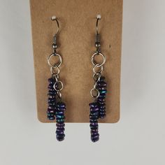 Handmade Earrings Nwt As Pictured. This Item Ships In A Gift Pouch. Thanks For Looking! Purple Metal Beaded Drop Earrings, Purple Metal Earrings With Dangling Beads, Adjustable Wire Wrapped Purple Beaded Earrings, Adjustable Purple Wire Wrapped Beaded Earrings, Iridescent Dangle Beaded Earrings With Ear Wire, Adjustable Iridescent Beaded Earrings, Purple Dangle Beaded Earrings Wire Wrapped, Nickel-free Purple Beaded Earrings With Round Beads, Purple Wire Wrapped Beaded Earrings For Gift