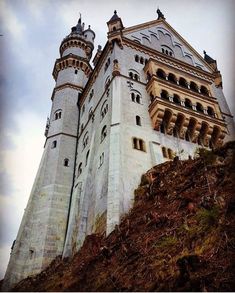 an old castle on top of a hill