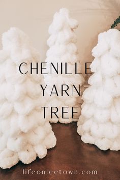 three cotton balls are stacked on top of each other in front of the words, chenille yarn tree