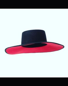 Black wide brim, red bottom hat. Quality soft wool touch and the essential statement piece that your outfit needs. One size fits all. Red Curved Brim Fedora For Winter, Trendy Fitted Felt Hat For Winter, Elegant Red Fedora For Fall, Classic Red Felt Hat For Fall, Red Wide Brim Hat For Fall, Red Wide Brim Fedora For Fall, Red Wide Brim Felt Hat For Formal Occasions, Red Brimmed Felt Hat For Fall, Red Fitted Top Hat For Winter