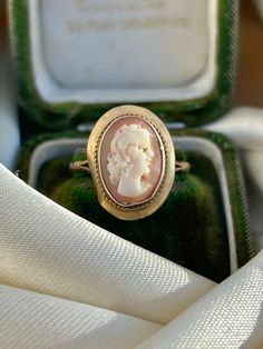 Vintage 9ct Gold Cameo Ring  sweet cameo ring  The item comes without the box in the photos but will be presented in a gembank1973 gift box   Measurements: Weight 2.66g, size O, head of ring 17mm x 12mm, height off finger 6mm Materials: 9ct gold  Hallmarks: hallmarked 375     Condition : The overall condition is very good office use: Gold Hallmarks, Costume Jewelry Rings, Cameo Ring, Snake Ring, Cocktail Rings, Yellow Gold Rings, Stone Rings, Jewellery And Watches, Band Rings