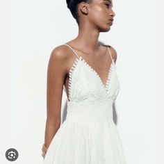 Cotton Polyester Flowy Lace Dresses With Lace Back, Chic Beach Dress With Lace Bodice, Delicate Lace V-neck Dress For Brunch, Spring Beach Dress With Lace Bodice, Summer V-neck Lace Dress With Lace Back, Sleeveless Lace Back Dress For Brunch, Spring Vacation Dress With Delicate Lace, Spring Vacation Lace Dress, Spring Vacation Dresses With Delicate Lace