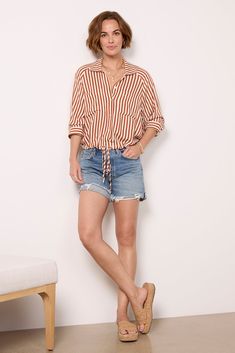 A drawstring hem adds a unique flair to this classic button-down by LNA. Crafted in lightweight fabric, this striped top features a collared neckline, relaxed fit, and two chest pockets. Pair with your favorite cutoffs and sandals for a polished summer look. | LNA Women's Alpine Drawstring Button Down Shirt, Size Medium, Orange West Coast Fashion, Brand Style Guide, Fashion 101, Summer Look, Long Shorts, Fall Shopping, Tee Dress, Work Fashion, Fall Trends