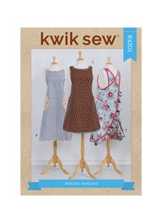 three dresses on wooden mannequins in front of a sign that says kwik sew