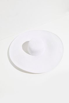 Stay in the shade at the beach and beyond with this super oversized straw hat featuring a large, floppy brim.* Lightweight * Packable, unstructured design White Wide Hat, Lightweight Chic Straw Hat For Vacation, Chic Lightweight Straw Hat For Vacation, Chic Packable Sun Hat With Curved Brim, Chic Curved Brim Packable Sun Hat, Chic Sun Hat With Curved Brim And Foldable Design, Chic Straw Hat For Beach, Chic Flat Brim Sun Hat For The Beach, Chic Flat Brim Sun Hat For Beach