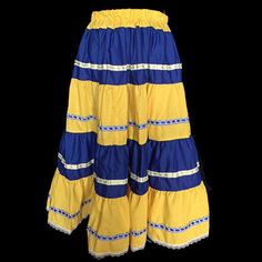 Santo's skirt Note: Our pictures are to give you an idea about our final job because each piece is different and exclusive. If you have any question or an special request please feel free to ask. Sientase comodode preguntar. Hablamos espanol. Thank you Zuhemy Traditional Tiered Skirt With Attached Cancan, Yellow Long Ruffled Skirt, Yellow Tiered Gathered Skirt, Yellow Gathered Tiered Skirt, Yellow Lined Tiered Skirt, Yellow Tiered Lined Skirt, Yellow Tiered Ruffled Skirt, Multicolor Cotton Ruffled Skirt, Yellow Relaxed Tiered Skirt