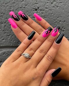 Acrylic Nail Designs Pink And Black, Black Nails With Pink Flames, Black Nails With Flame Design, Mgk Concert Outfit Ideas Pink, Hot Pink Nails With Flames, Nail Art Designs Pink And Black, Nails Pink And Black Design, Black And Pink Fire Nails, Pink And Black Gel Nails Ideas