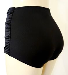 High waisted skirt swimwear bottom. High waisted bikini bottoms. Skirt bathing suits. Gathered skirt bottoms. Ruched side swim skirt bottoms. Skirt swimwear for women Swim skirt has a conservative bottom with low leg and high waist. Skirt Overlay covers front area from waist to crotch level. Looks like a skirt in front and high bikini bottom at back. Can be ordered in other prints in store. http://www.mirasolswimwear.com/pages/fabrics-for-swimwear Hand made and made to order. Please provide wais Stretch Swim Dress With Built-in Shorts, Fitted Beachwear Swim Dress With Built-in Shorts, Fitted Beachwear Shorts, Solid Swimwear With Ruched Sides For Beachwear, Solid Beachwear Swimwear With Ruched Sides, Solid Color Beachwear Swimwear With Ruched Sides, Swimwear With Ruched Sides And Tie-side Bottom, Tie-side Bottom Swimwear With Ruched Sides, High Waist Elastic Swimwear