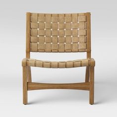 a wooden chair with woven seat padding on the back and sides, viewed from the front