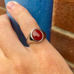 The Red Agate Ring - Created using natural red agate stone. Every stone is unique making it the perfect Ring for your unique style. The Red Agate Ring is slightly raised showing off the deep red colour in more detail. Also available in Black Onyx (Real stone) & Green Opal (Lab Created) & Lapis Lazuli (Royal Blue) on our page. Unisex ring, womens sizes available DETAILS  Materials: Stainless Steel (Base) & 18K Gold PVD Plating. Red Agate Gemstone  Available in all sizes, Mens & Womens - Please ch Red Carnelian Rings With Polished Finish, Red Polished Carnelian Rings, Red Carnelian Ring With Polished Finish, Red Carnelian Signet Ring With Polished Finish, Red Oval Agate Jewelry, Classic Red Agate Jewelry, Red Agate Jewelry With Polished Finish, Gift Agate Signet Ring With Polished Finish, Ring Men Silver