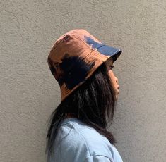 bleach dye bucket hats | DAKJEN TIE DYE BUCKET HATS wear this bucket hat to the beach, to a casual lunch, or even out and about to shield yourself from the sun. *HATS RUN SMALL*  head circumference size: 21-22.5in  100% cotton  colors:  - blue & tan  - red & orange  - black & grey - white & lavendar/blue Adjustable Faded Summer Hat, Adjustable Faded Hat For Summer, Adjustable Tie Dye Hats For Summer, Adjustable Tie Dye Summer Hat, Summer Tie-dye Adjustable Hat, Faded Curved Brim Hats For Summer, Casual Faded Summer Hat, Faded Casual Summer Hat, Summer Tie-dye Hat With Curved Brim