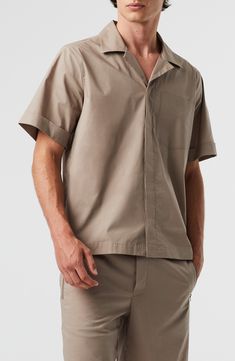 Cleanly designed with a concealed button placket, this lightweight shirt features short cuffed sleeves and a raised logo. 29" length; 45" chest (size Medium) Front button closure Hidden-button placket Notched collar Short sleeves Chest patch pocket 65% polyester, 33% cotton, 2% spandex Machine wash, line dry Imported Staff Uniform Design, Restaurant Staff Uniform, Restaurant Staff, Staff Uniforms, Concert Looks, Uniform Design, Flip Flop Slippers, Sweaters And Leggings, Comfortable Sandals