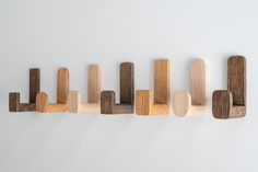 several pieces of wood are arranged in a row