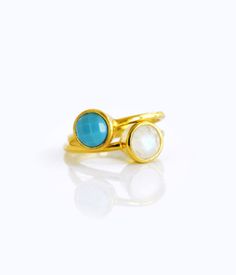 "You'll love this combination of natural rainbow moonstone and turquoise stones in this ring set. Easy to stack together on one finger. Available in vermeil gold or sterling silver. Gemstone is approximately 6 mm in diameter. Band has 925 stamp on inside. Please note that each ring is handmade and there may be some slight variations from listing photo. Available in: ✦ 18K VERMEIL GOLD. ✦ BRIGHT STERLING SILVER. - - - - - - - - - - - - - - - Please visit my full collection of MOONSTONE: http://ww Blue Moonstone Stackable Ring, Blue Moonstone Rings With Natural Stones, Turquoise Moonstone Ring With Natural Stones As Gift, Turquoise Gemstone Stackable Rings, Blue Round Stackable Moonstone Ring, Blue Stackable Round Moonstone Ring, Turquoise Gemstone Moonstone Ring, Gift Multicolor Multi-stone Turquoise Ring, Gold Oval Multi-stone Turquoise Ring