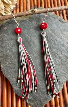 These are about 4.5 inches in length on silver plated lever back ear wires. Colors are red, white, silvers and black. Beads add an extra sparkle. Handmade. Adjustable Red Jewelry With Tassels, Adjustable Red Tasseled Jewelry, Bead Stitching, Tassel Earrings, Black Beads, Ear Wires, Czech Glass, Jewelry Earrings Dangle, Silver Plate