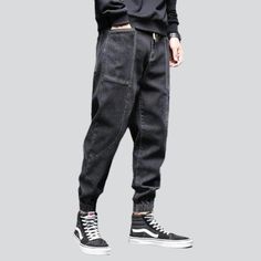 Take your fashion game to the next level with our 2023 Autumn Collection's street dark men's denim joggers! These monochrome. mid-waist joggers are perfect for making a statement. yet still keeping it comfortable and stylish. With their drawstring closure and stretchy fabric. they promise to keep you looking sharp even during the most intense streetwear looks.Why You'll Fall In Love Street Style: Make an impact with these joggers. designed to keep you looking your best no matter the season or oc