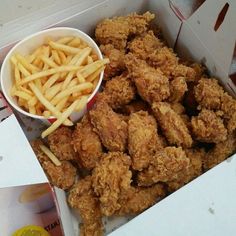 fried chicken and french fries in a box