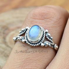 Rainbow Moonstone Ring ~ Moonstone Ring ~ Oval Moonstone Ring ~ Moonstone Stacking Ring ~ Filled Moonstone Ring ~boho silver ring for girl's ~ Free Shipping *Main Stone : Rainbow Moonstone *Main Stone Color : White * Main Stone Size :- 6 x 8 mm Approx. *Metal : Sterling Silver *Base Metal : 925 parts per 1000 *Style : Ring What Are The Benefits of Silver Jewelry Silver has a long history in antibiotics and sterilization, with many women and men wearing silver jewelry to stave off infection, cold/flu symptoms, and any other virus, bacteria, etc. This health benefit is one of the reasons why so many manufacturers choose to make medical devices and tools out of silver. Silver also helps with internal heat regulation and circulation. Many have reported improvements in energy levels and balance Bohemian Adjustable Moonstone Birthstone Ring, Bohemian Opal Birthstone Ring, Bohemian Moonstone Crystal Ring With Birthstone, Bohemian Moon Shaped Gemstone Ring, Silver Moon Shaped Bohemian Crystal Ring, Silver Moon-shaped Bohemian Crystal Ring, Silver Bohemian Moon Shaped Crystal Ring, Bohemian Moonstone Crystal Ring In Moon Shape, Silver Bohemian Moon-shaped Crystal Ring