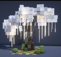 a tree made out of cubes in front of a blue background