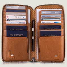 Bravo Family Leather Passport Holder - Vaja Luxury Travel Wallets With Bill Compartment, Modern Travel Cases With Interior Card Slots, Functional Brown Travel Wallet, Modern Travel Wallets With Zipper Closure, Leather Travel Wallet With Zipper Pocket, Leather Wallet With Zipper Pocket For Travel, Functional Travel Bag With Card Slots, Functional Leather Travel Wallet, Leather Travel Bag With Rfid Blocking