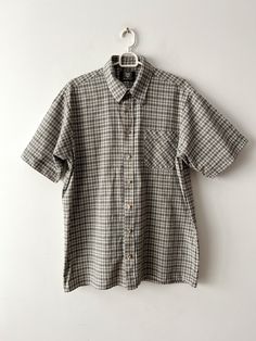 "Vintage Large size plaid summer shirt  Bavarian Shirt Men Dirndl Short Sleeve Shirt Folk Traditional German Shirt Oktoberfest Trachten Top Label size: L 41/42 Measurements: (lying flat) Length - 31\"/ 78.7 cm Shoulders: 18.5\"/ 47 cm Pit to pit: 23\"/ 58.3 cm/ Waist: 23\"/ 58.3 cm Sleeve: 10.5\"/ 26.5 cm Collar: 16.5\"/ 42 cm Please check measurements to insure a proper fit. Remember to allow yourself some extra room for movement. You can compare these with something from your closet that fits you well. This shirt will come to you freshly laundered and ready to wear. Please feel free contact me if you need additional measurements or have any questions Condition: great vintage condition SHIPPING * I ship worldwide via Priority mail (Latvijas Pasts) from Latvia (EU). * I ship from Europe, s Spring Plaid Linen Shirt, Classic Plaid Linen Shirt, Summer Plaid Short Sleeve Camp Shirt, Classic Plaid Short Sleeve Shirt For Summer, Summer Outdoor Button-up Short Sleeve Shirt, Summer Outdoor Short Sleeve Button-up Shirt, Gingham Cotton Short Sleeve Shirt, Classic Plaid Shirt For Summer, Plaid Relaxed Fit Shirt For Summer