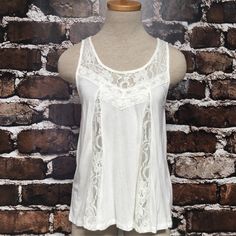 Never Worn Casual White Tops With Lace Trim, White Casual Top With Lace Trim, White Casual Tops With Lace Trim, White Casual Tank Top For Spring, Casual White Tank Top For Spring, White Lace Trim Tank Top For Spring, Bohemian Cotton Lace Top Tank Top, White Lace Trim Tank Top For Day Out, Fitted Lace Patchwork Casual Tank Top