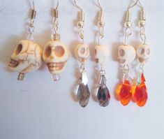 White skull earrings. Choose large skull or smaller skull with orange or grey drop. Each sold separately. Each sold separately. U.S. quarter is to show size of earrings. Beaded Halloween, Teal Pumpkin, Sugar Skull Earrings, Rabbit Earrings, Skull Beads, Small Skull, Halloween Beads, Pink Pumpkins, Bead Ideas