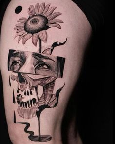 a woman's thigh with a sunflower on it and a skull in the middle