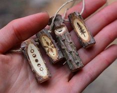 two pieces of wood that have been made into ornaments