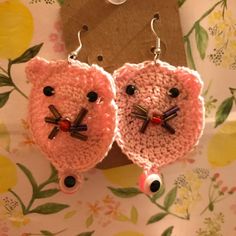 Pink Cat And Pink Evil Eye Crochet Earrings.2 Inch-5 Cm This Item Is A Handmade Crochet Cat Earring. The Earring Hooks Are Hypoallergenic. There Is Also A Pink Evil Eye Attached To The Bottom It’s Eyes, Whiskers And Nose Is Made Out Of Beads. Quirky Handmade Pink Earrings, Handmade Cat Ears Jewelry For Gifts, Cute Handmade Cat Ears Jewelry, Handmade Cat Ears Jewelry For Gift, Handmade Novelty Crafts For Crafting, Pink Cat Design Earrings With Cat Ears Shape, Gold Earring Cuff, Evil Eye Crochet, Eye Crochet